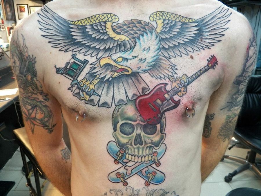 Traditional eagle chest piece with guitar and skull, by Steve