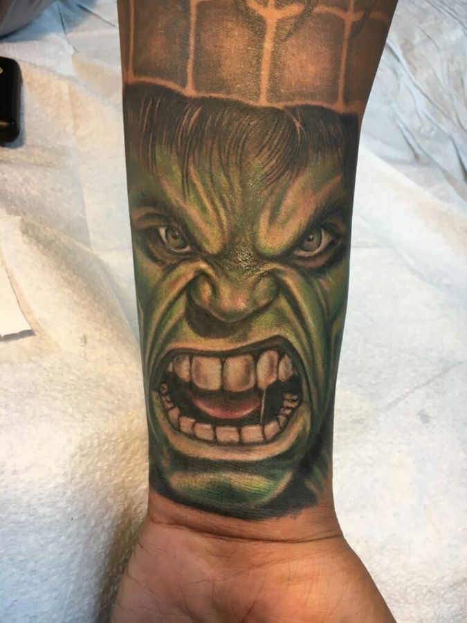 The Hulk in color realism on a forearm, by Steve