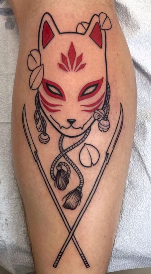 Fine-line kitsune mask with ornamental details on a forearm, by Momo
